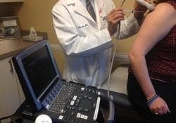 Doctor performing an ultrasound guided injections